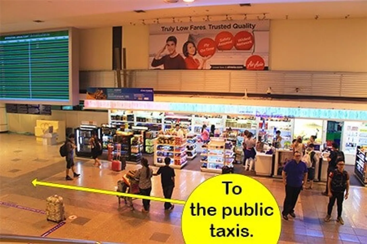 Once you head down the escalators at Don Mueang start looking for the taxi signs