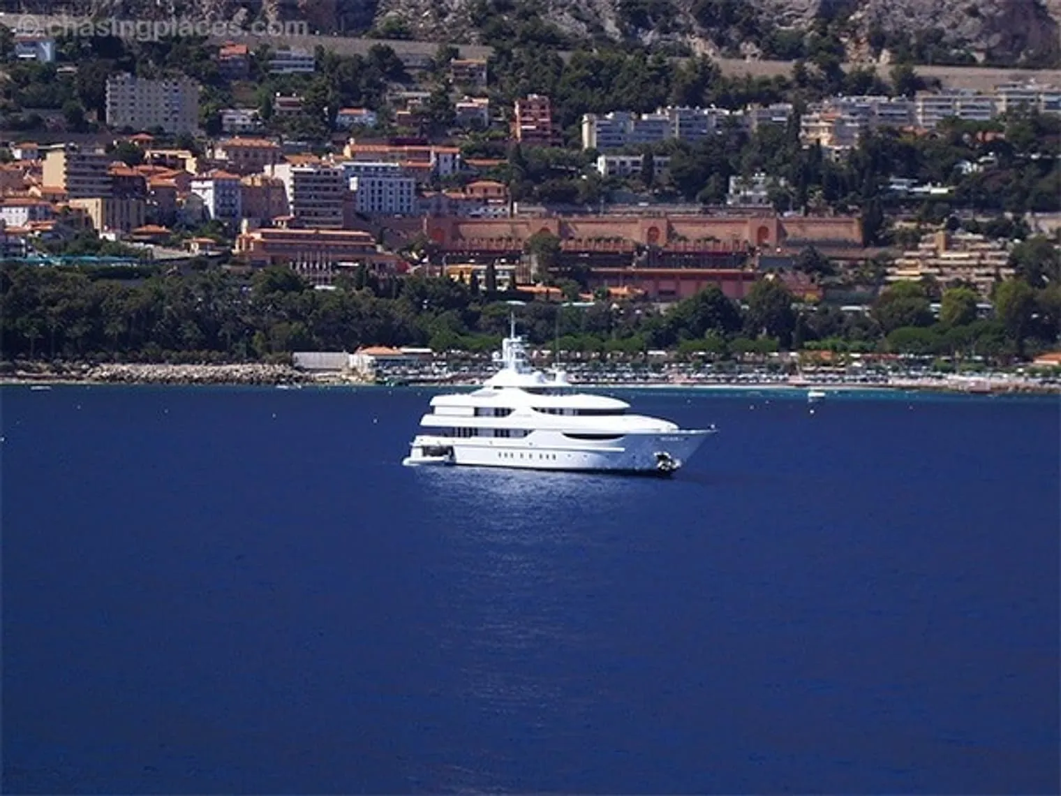 A high budget yacht just off the coast in front of Monte Carlo