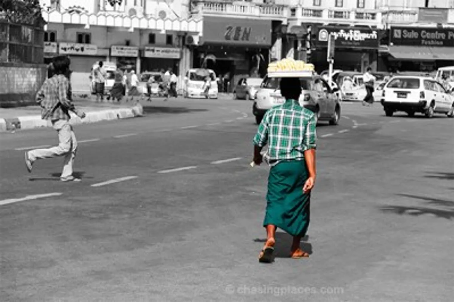 Directly in front of the Sule Pagoda, this gentleman transports some carbs to his street side stall in order to make some additional kyat for the day.