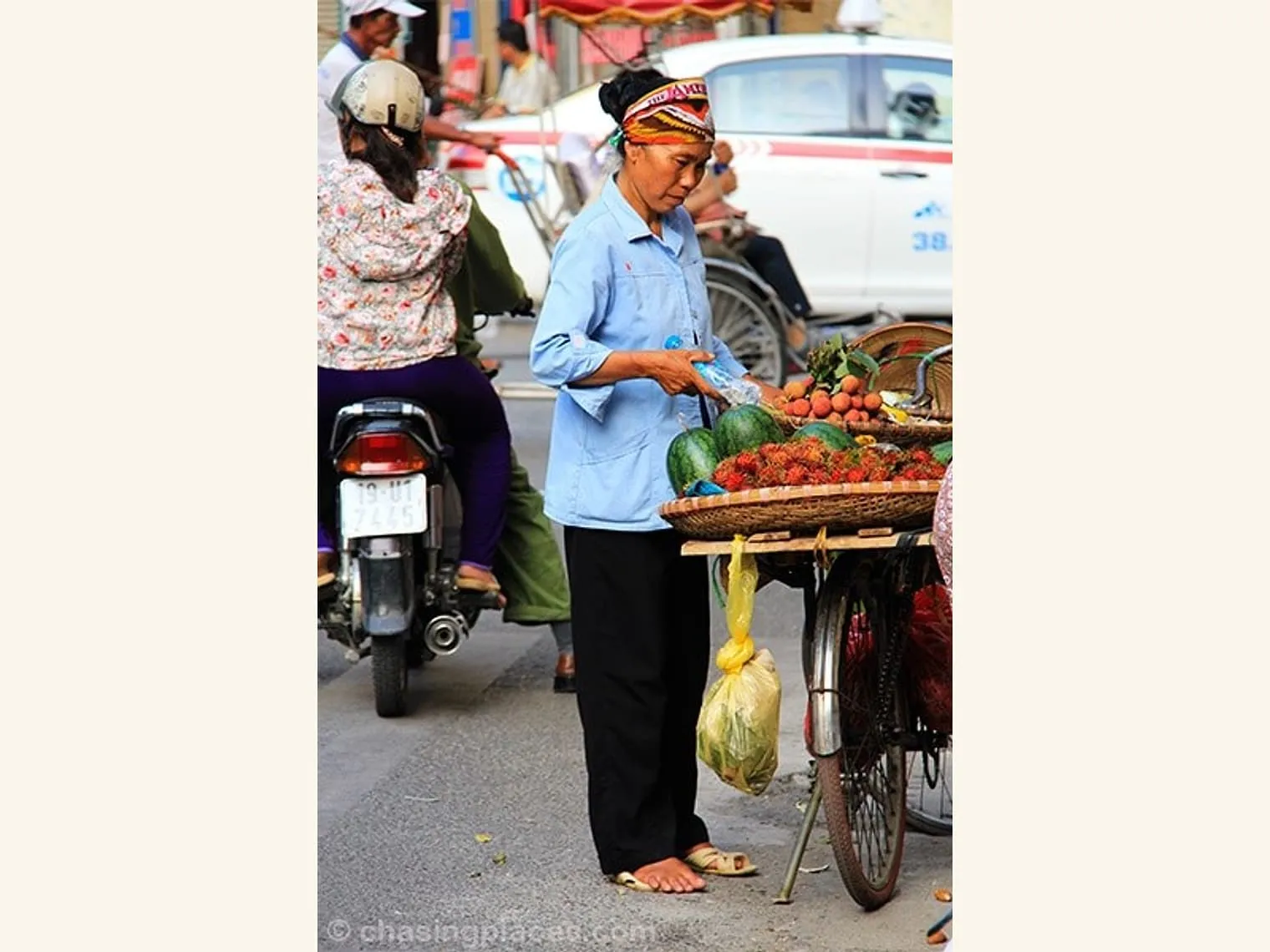 Fruit vendor in the Old Quarters of Hanoi
