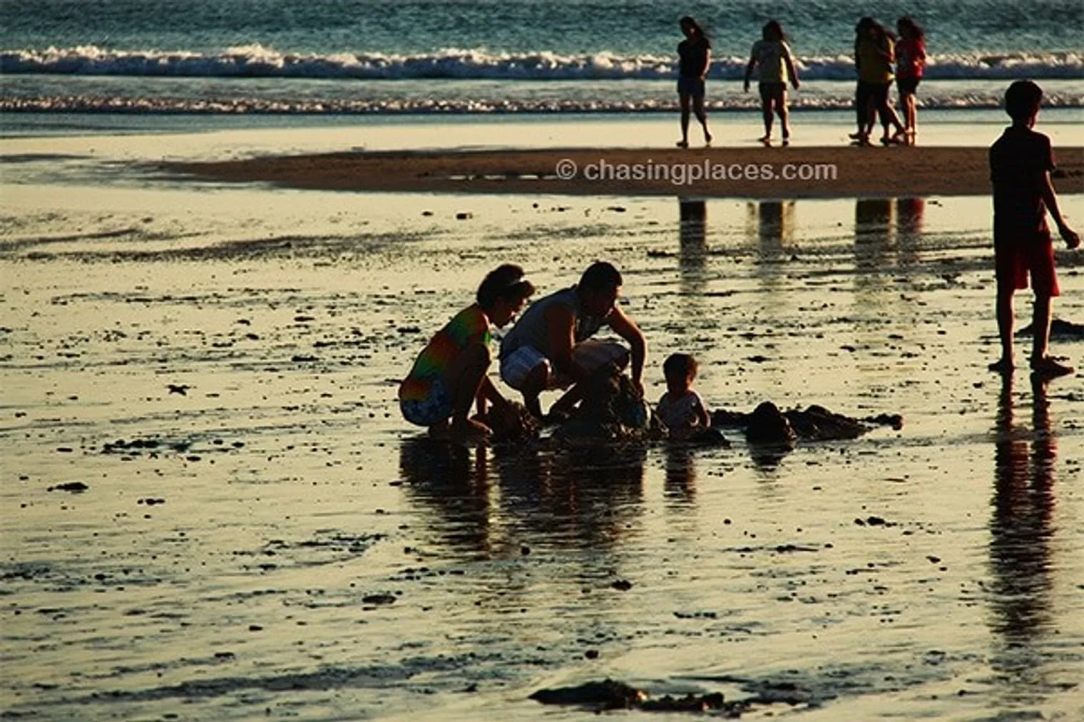 A unique mix of locals and foreigners line Bali’s Kuta Beach for its famous sunset