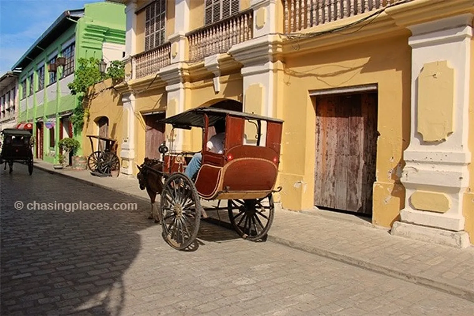 A calesa whisking through Vigan's historical district in the northern Philippines