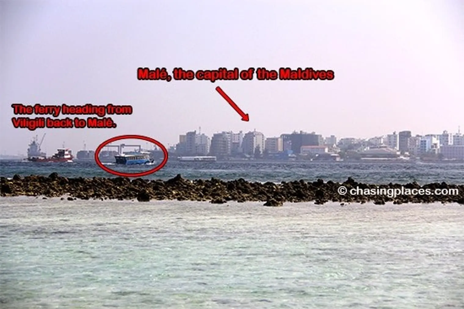 Get a glimpse of Male from the eastern shoreline of Viligili